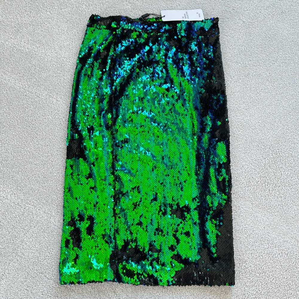 Sequin skirt. Great as a mermaid skirt.  Colors are  green, blue and black.